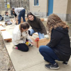 FoodCorps service members assembling garden beds