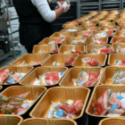 School nutrition workers prepare meals for students during the pandemic